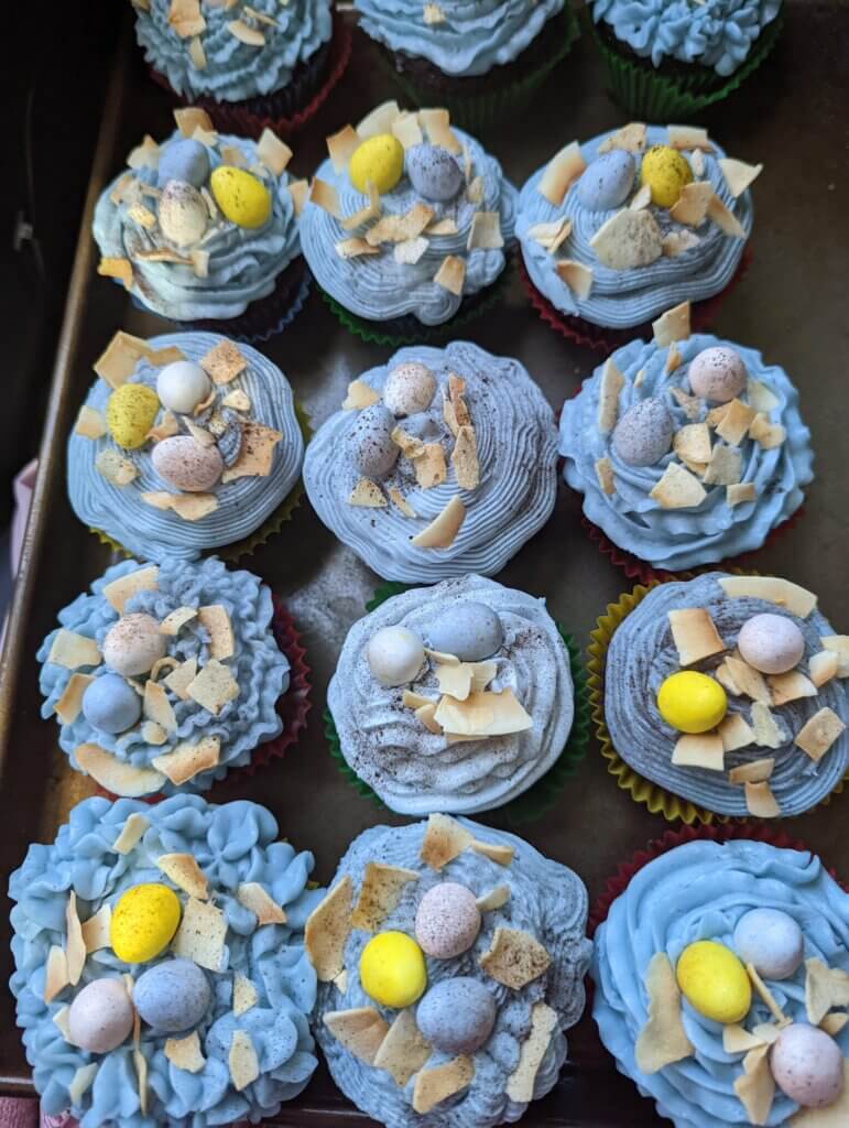 Easter Cupcakes with Chocolate Eggs and Coconut Flakes
